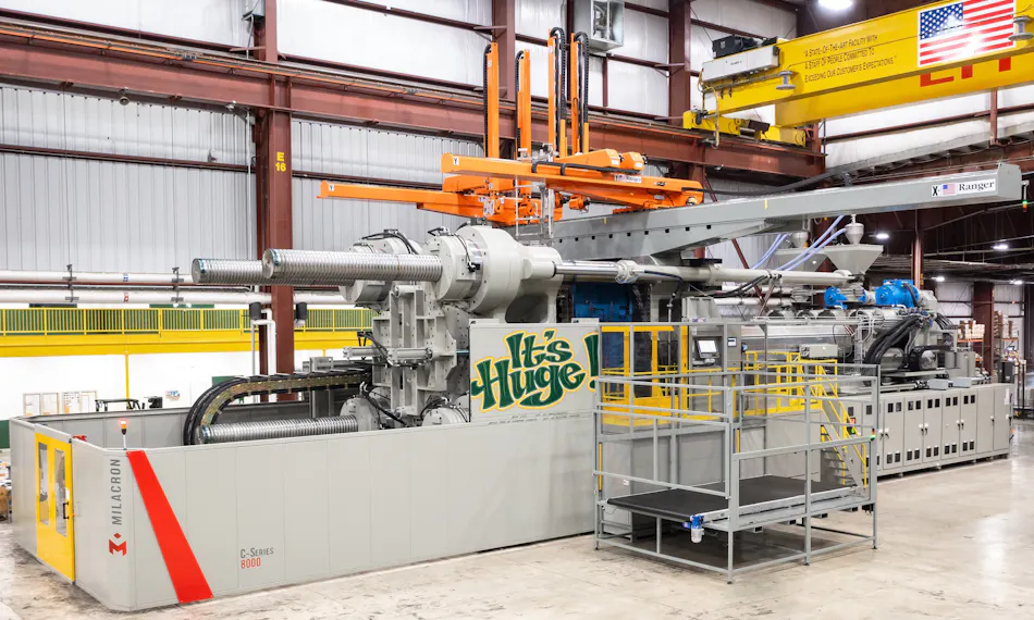 Goliath Milacron machine tips scales with 8,000 tons of clamping force ...