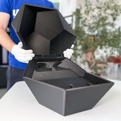 Designed to look like a soccer ball, this specially printed plastic box was presented to soccer star Lionel Messi as he was recognized with the Ballon d’Or award, Designed to look like a soccer ball, this specially printed plastic box was presented to soccer star Lionel Messi as he was recognized with the Ballon d’Or award,