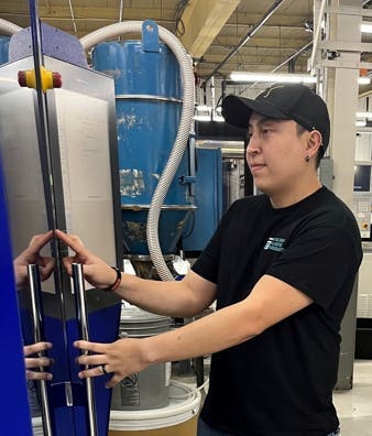 Stelray Plastic Products Inc., Ansonia, Conn., is one plastics processor that takes seriously its role in building the workforce. Jose Castillo, shown here, has risen from a temporary worker to shift supervisor.
