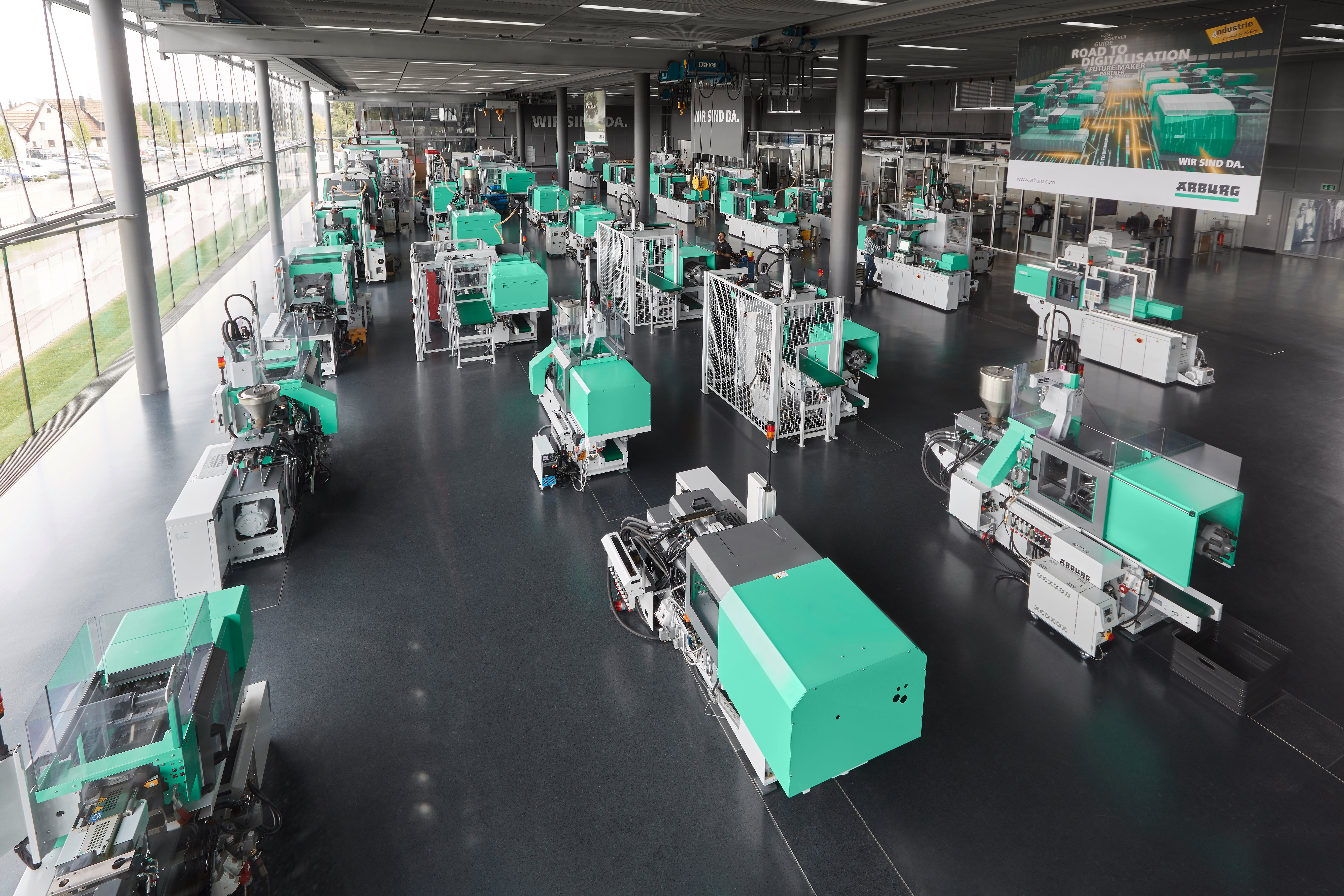Injection molding machines are on display in Arburg's Lossburg, Germany, headquarters.