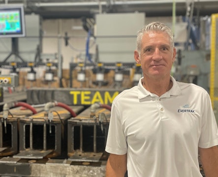 Evertrak Founder and CEO Tim Noonan stands in front of some of the molds that are used to form his company's Evertrak 7000 composite railroad ties.