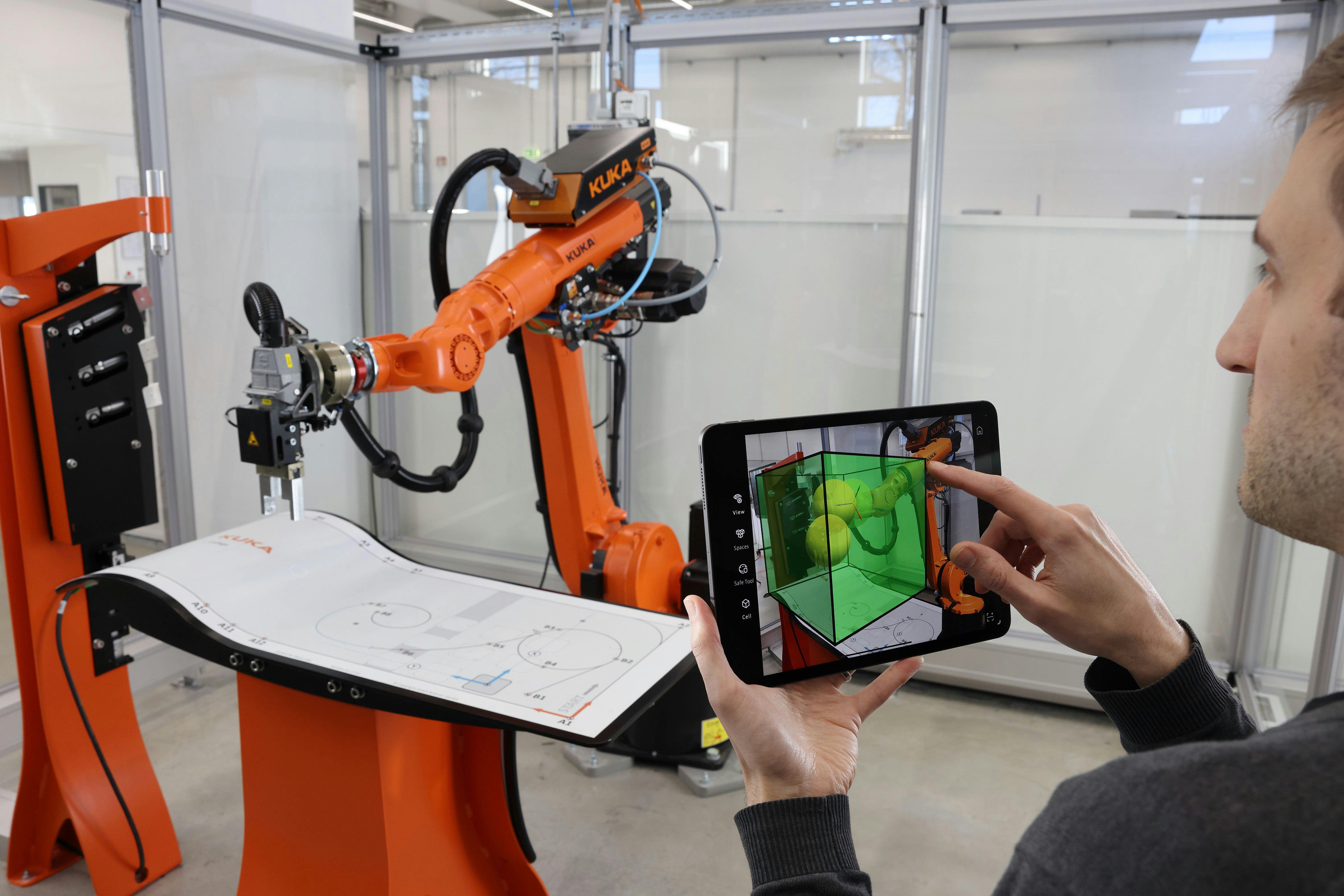 The Kuka.MixedReality app uses augmented reality to make robot setup easy.