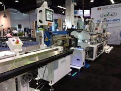 Conair, Davis-Standard and Zumbach produced photoluminescent tubing at this demonstration cell at MD&M/Plastec West. Conair, Davis-Standard and Zumbach produced photoluminescent tubing at this demonstration cell at MD&M/Plastec West.