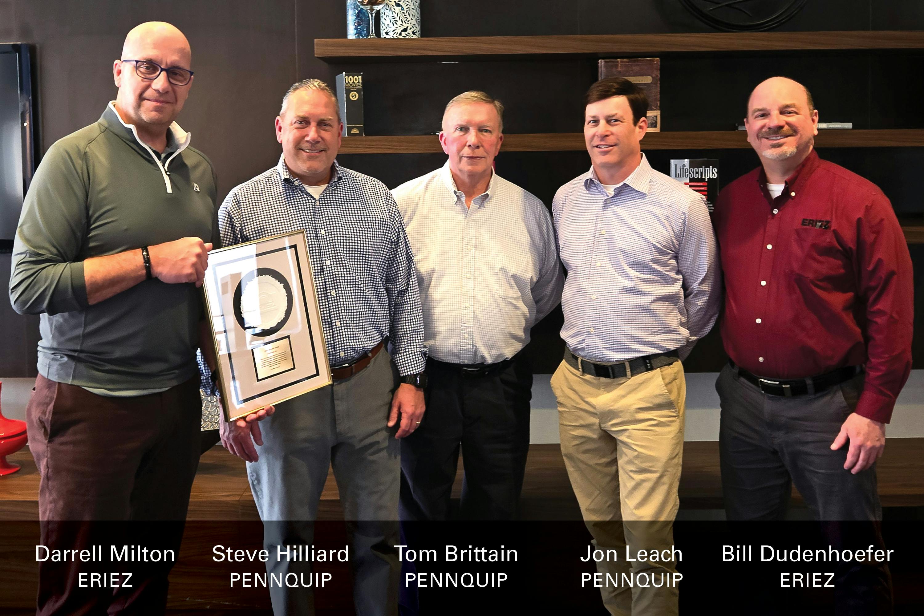Eriez presented its 2023 Merwin Award to PennQuip. From left, Darrell Milton, Eriez; Steve Hilliard, Tom Brittain and Jon Leach, PennQuip; and Bill Dudenhoefer, Eriez.