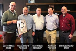 Eriez presented its 2023 Merwin Award to PennQuip. From left, Darrell Milton, Eriez; Steve Hilliard, Tom Brittain and Jon Leach, PennQuip; and Bill Dudenhoefer, Eriez.