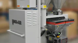 Dri-Air's second-generation on-demand drying/blending system incorporates a Maguire weigh scale blender to provide optimized drying of virgin materials and regrind.