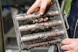 Bunting Magnetics Co.'s FF-MSCI quick-clean magnet insert system makes it quicker and easier to remove the ferrous material captured by its high-strength tube magnets. Bunting Magnetics Co.'s FF-MSCI quick-clean magnet insert system makes it quicker and easier to remove the ferrous material captured by its high-strength tube magnets.