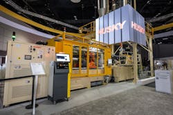 Husky&apos;s new HyPET6e injection molding machine worked alongside an integrated drying system to produce preforms comprised entirely of 100 percent recycled PET.