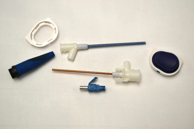 C&J Industries' new Nissei press allows the company to overmold parts like these, for the medical and telecom industries.