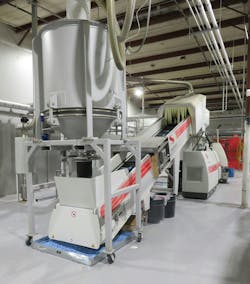 A Starlinger recycling system processes resin for use in containers at Clean Harbors. A Starlinger recycling system processes resin for use in containers at Clean Harbors.