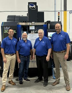 From left, Ryan Delahanty, Don Hammer, Brian Starnes and Steve Schermann pose for a photo together at the Milltronics headquarters in Indianapolis.
