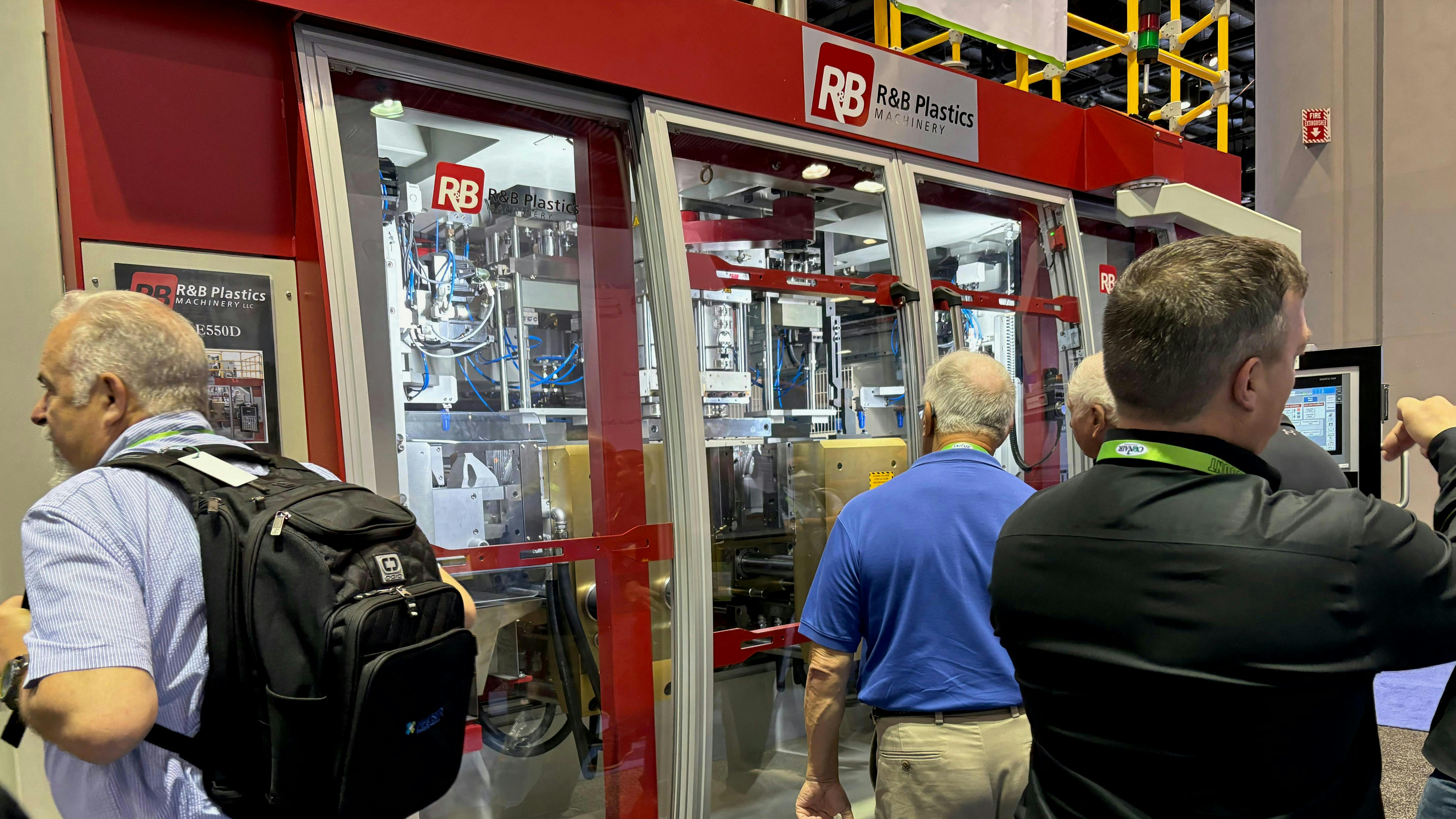 NPE2024 attendees check out R&B Plastics Machinery's new blow molder.