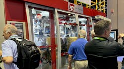 NPE2024 attendees check out R&B Plastics Machinery's new blow molder. NPE2024 attendees check out R&B Plastics Machinery's new blow molder.