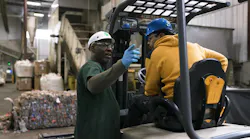 Lead tech Tommy Phillips talks to a colleague at Placon in Madison, Wis., which is among the recycling facilities spotlighted in a series of videos produced by the Plastics Industry Association showcasing the benefits of recycling.