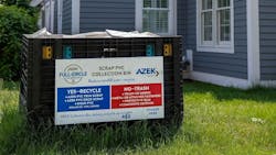 Azek and Return Polymers have teamed up on a project to make building products from recycled material. A collection bin is shown at a job site. Azek and Return Polymers have teamed up on a project to make building products from recycled material. A collection bin is shown at a job site.