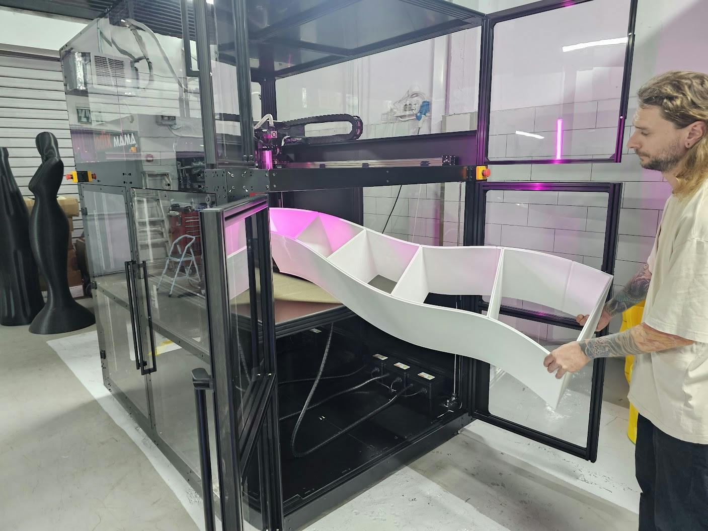 The Modix Mama-1700 prints large parts using standard pellets.