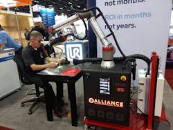 Alliance Specialties and Laser Sales has paired a solid-state laser welder with a Universal Robots cobot that can be used for mold repair. Scott Erickson, senior R&D laser process engineer, shows it off at NPE2024. Alliance Specialties and Laser Sales has paired a solid-state laser welder with a Universal Robots cobot that can be used for mold repair. Scott Erickson, senior R&D laser process engineer, shows it off at NPE2024.