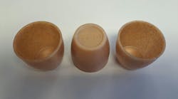 Injection molding machine makers say that customers are increasingly inquiring about biomaterials, like the material Boy used on one of its presses to form these cups. Injection molding machine makers say that customers are increasingly inquiring about biomaterials, like the material Boy used on one of its presses to form these cups.