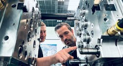 Arburg technicians work on a machine at the company’s Rocky Hill, Conn., facility. Between that site and Arburg’s headquarters in Germany, the company has performed more than 20 material trials for customers, helping them assess processability and optimize variables such as wall thickness. Materials that Arburg or its customers have worked with include paper, fiberglass cellulose and plant fiber. Arburg technicians work on a machine at the company’s Rocky Hill, Conn., facility. Between that site and Arburg’s headquarters in Germany, the company has performed more than 20 material trials for customers, helping them assess processability and optimize variables such as wall thickness. Materials that Arburg or its customers have worked with include paper, fiberglass cellulose and plant fiber.