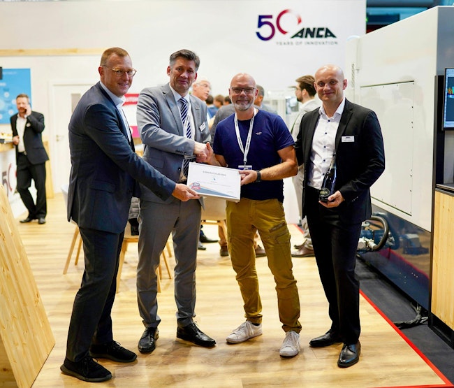 Torsten Mende, managing director at Werkzeugschleiferei Krämer, accepts ANCA's Tool of the Year award.