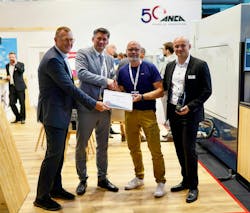 Torsten Mende, managing director at Werkzeugschleiferei Krämer, accepts ANCA's Tool of the Year award. Torsten Mende, managing director at Werkzeugschleiferei Krämer, accepts ANCA's Tool of the Year award.