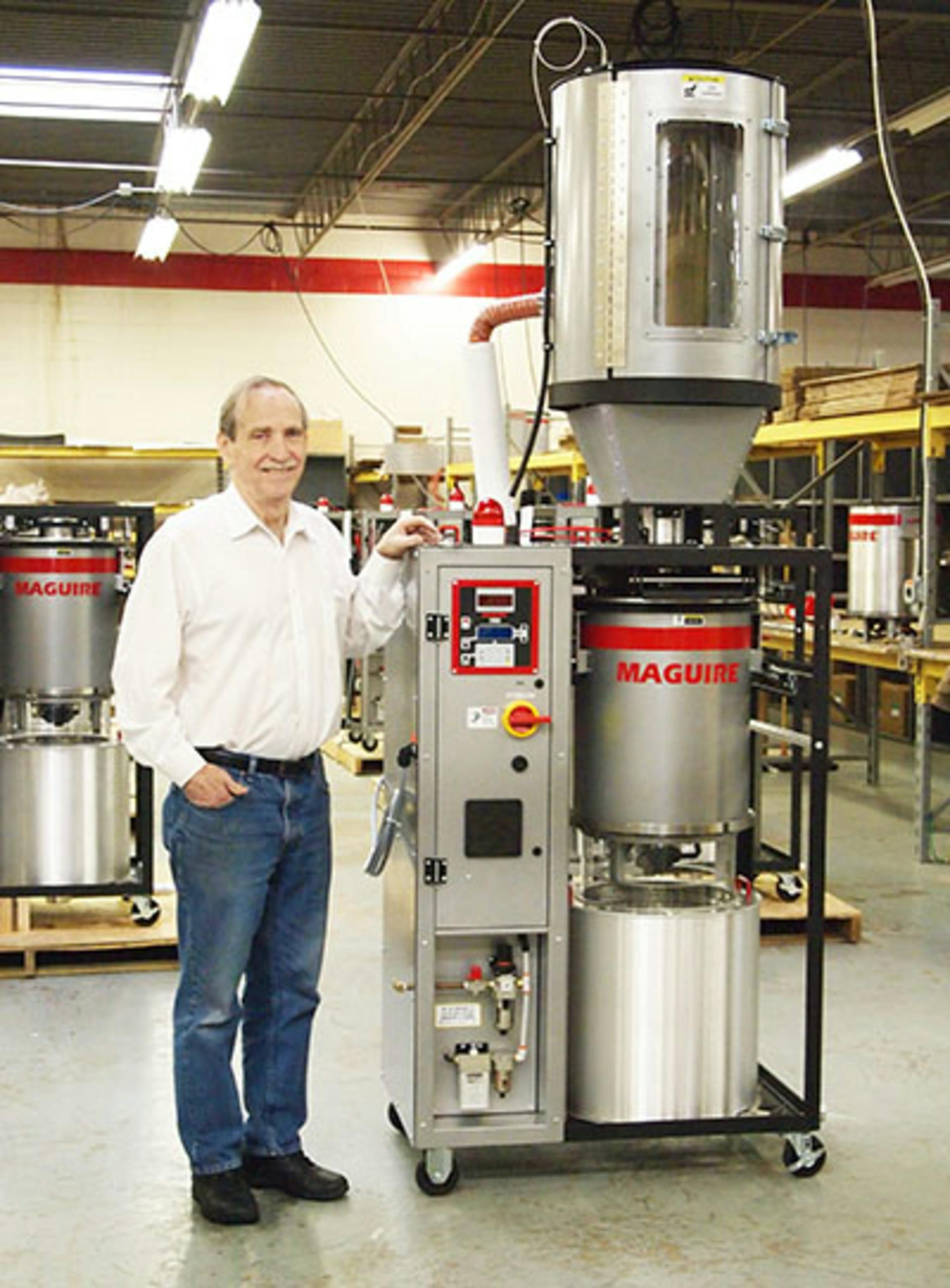 Steve Maguire, founder of auxiliary equipment maker Maguire Products Inc., Aston, Pa., poses with one of his many products.