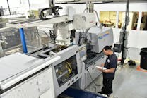Amid hiring challenges, molders have invested in automation. Among them is Rockford, Ill., Pyramid Plastics, where a Yushin robot is shown stationed above a press. Amid hiring challenges, molders have invested in automation. Among them is Rockford, Ill., Pyramid Plastics, where a Yushin robot is shown stationed above a press.