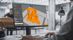 A computer screen running SlicEx software. A computer screen running SlicEx software.