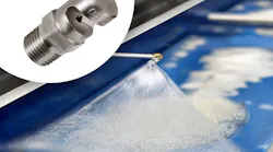 An Exair FloodStream nozzle sprays suds onto a blue surface.
