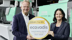 Managing Partners Michael and Juliane Hehl display Arburg's EcoVadis Gold Medal.
