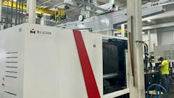 American Plastic Molding in Scottsburg, Ind., is beginning the new year with a new 900-ton molding machine from Milacron. Acquired late last year, it replaces a 725-ton molding machine that took up the same footprint. Adam Auffart, VP of sales and marketing for APM, says tariffs proposed by President-elect Donald Trump might steer more customers to the shop's mold-making and molding services. American Plastic Molding in Scottsburg, Ind., is beginning the new year with a new 900-ton molding machine from Milacron. Acquired late last year, it replaces a 725-ton molding machine that took up the same footprint. Adam Auffart, VP of sales and marketing for APM, says tariffs proposed by President-elect Donald Trump might steer more customers to the shop's mold-making and molding services.