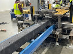 An Evertrak 7000 composite railroad tie passes through the texturing station, which creates additional grip on the tie's surface. An Evertrak 7000 composite railroad tie passes through the texturing station, which creates additional grip on the tie's surface.