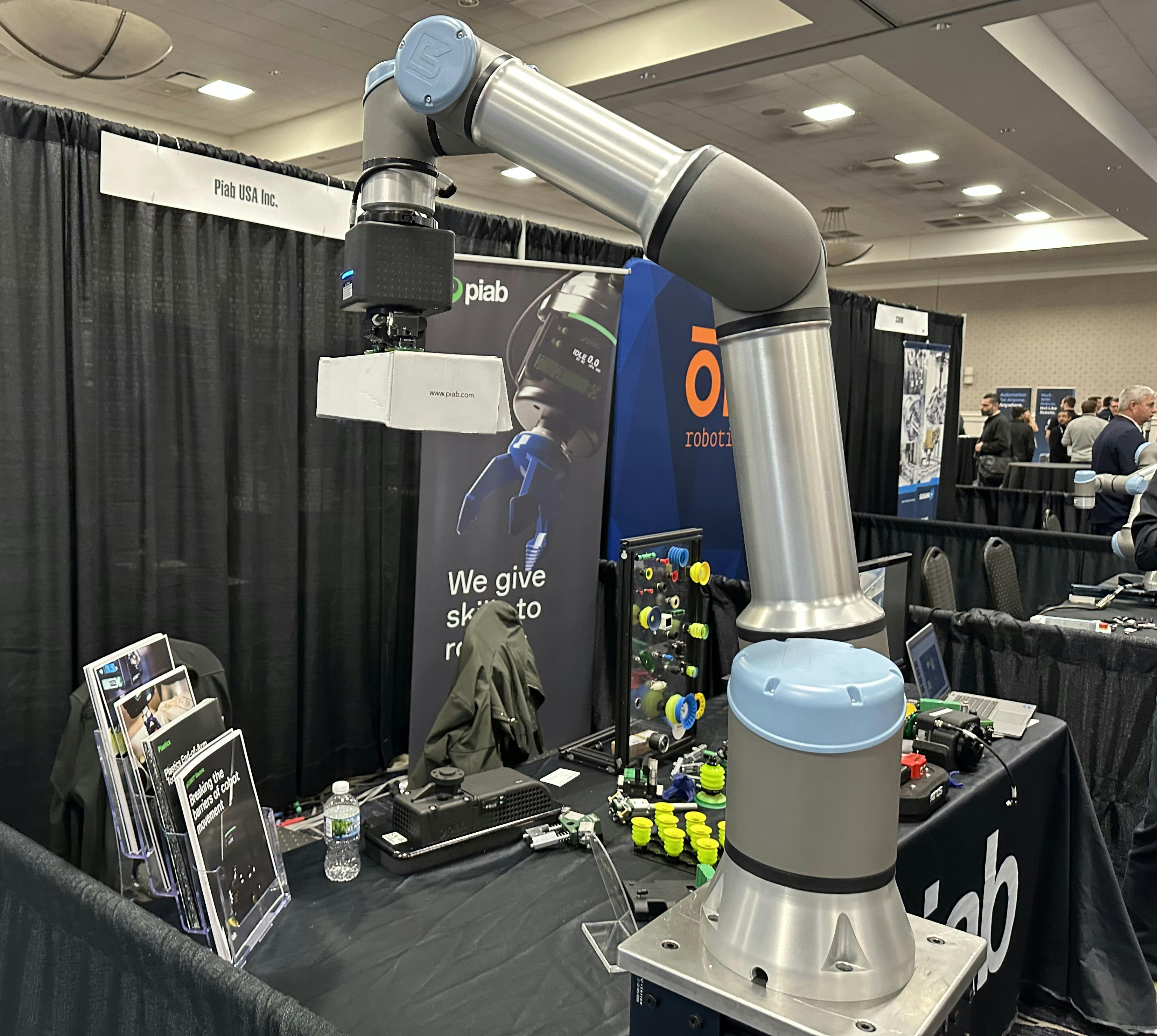 A cobot is shown in a booth at Collaborate 2025 in January. Sales of automation equipment were virtually flat in 2024, according to statistics released at the event.