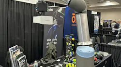 A cobot is shown in a booth at Collaborate 2025 in January. Sales of automation equipment were virtually flat in 2024, according to statistics released at the event.