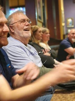 Artie Riegger, regional sales manager for extrusion for KraussMaffei Corp., shares a laugh with people at a restaurant last year in Florence, Ky., where the equipment manufacturer has its U.S. headquarters. Artie Riegger, regional sales manager for extrusion for KraussMaffei Corp., shares a laugh with people at a restaurant last year in Florence, Ky., where the equipment manufacturer has its U.S. headquarters.
