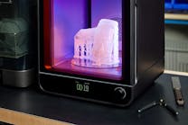 The new generation of the Formlabs Form Cure appears purple when it is actively curing. The new generation of the Formlabs Form Cure appears purple when it is actively curing.