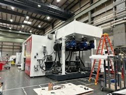 A 1,500-ton injection molding machine is shown under construction at Milacron's Batavia, Ohio, facility in 2023. A 1,500-ton injection molding machine is shown under construction at Milacron's Batavia, Ohio, facility in 2023.