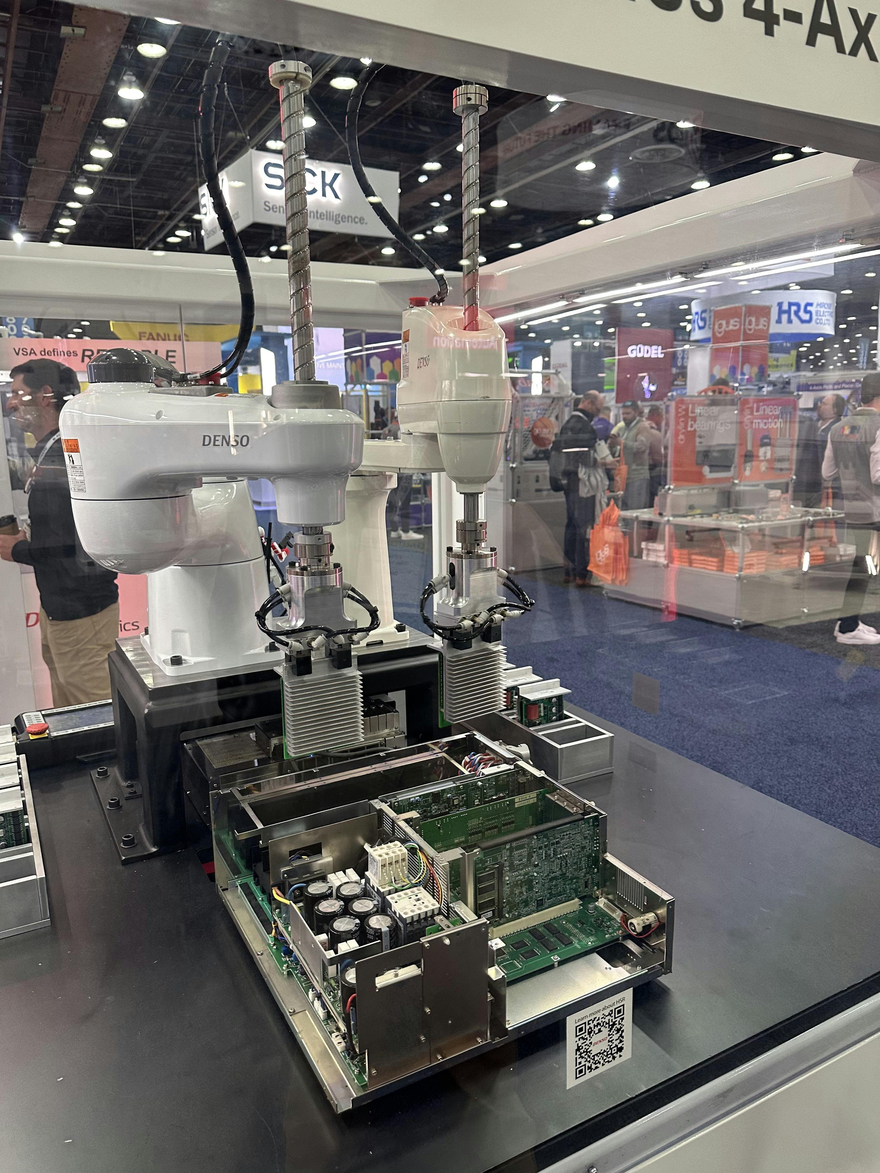 Denso's dual-arm controller allows two SCARA robots to work together.