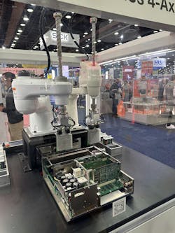 Denso's dual-arm controller allows two SCARA robots to work together. Denso's dual-arm controller allows two SCARA robots to work together.