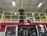 R&B Plastics Machinery President and GM Fred Piercy atop a blow molding machine at the company's Saline. Mich., plant. R&B Plastics Machinery President and GM Fred Piercy atop a blow molding machine at the company's Saline. Mich., plant.