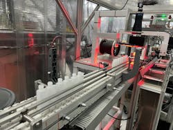 Dual-chamber bottles undergo visual inspection at Currier Plastics. Dual-chamber bottles undergo visual inspection at Currier Plastics.