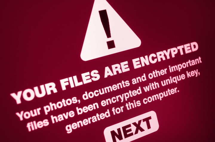 Computer screen displays notification of a cyberattack.