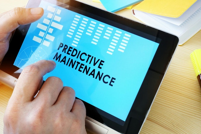 A hand taps a tablet screen with the words 'Predictive Maintenance.'