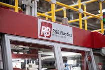 The R&B logo on a red blow molding machine. The R&B logo on a red blow molding machine.