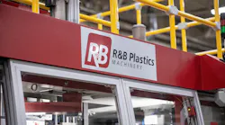 The R&B logo on a red blow molding machine.