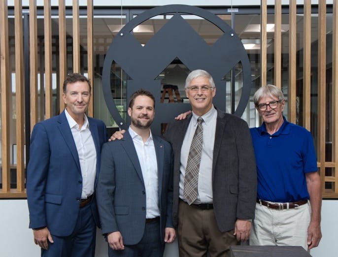 From left, Andrew Wheeler, president of Windmoeller & Hoelscher Corp.; Brad Humbolt, new president of Addex; and Addex co-founders Bob Cree and Rick von Kraus.