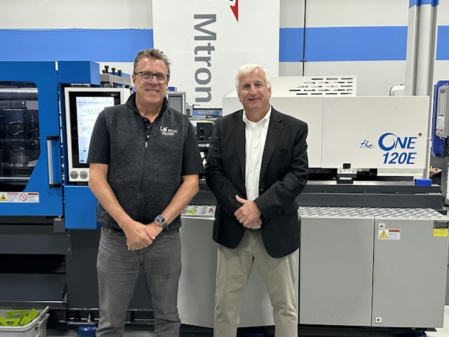 Peter Gardner, left, is retiring as president of LS Mtron Injection Molding Machine USA. Paul Caprio, right, president of sales, will be taking over some of his duties. They were photographed in late 2023 at the company's Wood Dale, Ill. technical center.