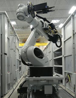 Seven-axis Kuka robot services three machining centers in the Hermle work cell. Seven-axis Kuka robot services three machining centers in the Hermle work cell.