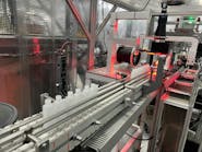 Dual-chamber bottles undergo visual inspection at Currier Plastics Dual-chamber bottles undergo visual inspection at Currier Plastics