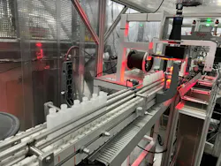 Dual-chamber bottles undergo visual inspection at Currier Plastics Dual-chamber bottles undergo visual inspection at Currier Plastics